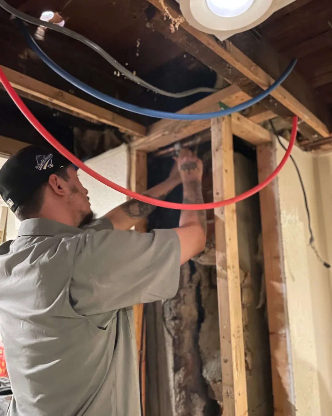 Beaver Services tech doing some wiring