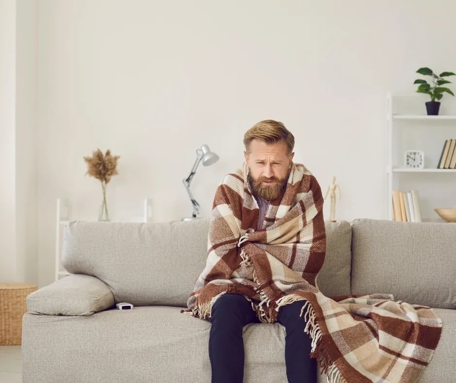 Man wrapped in a blanket